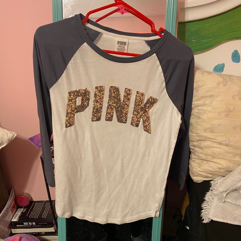 A white and grey pink Victoria secret shirt